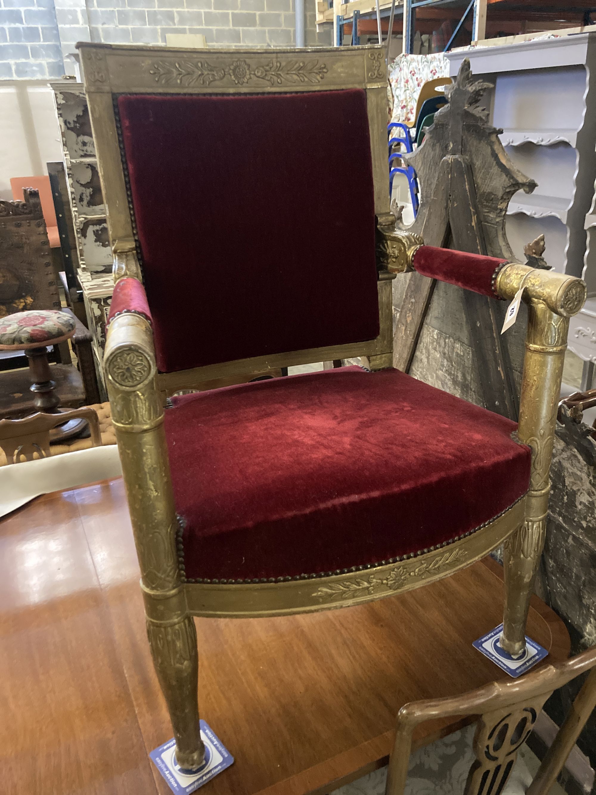 An Empire revival giltwood fauteuil, width 64cm, depth 50cm, height 98cm